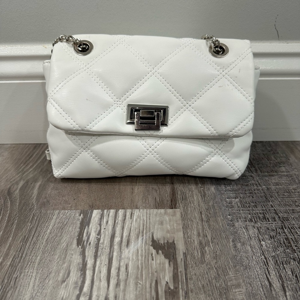 White purse with silver accents